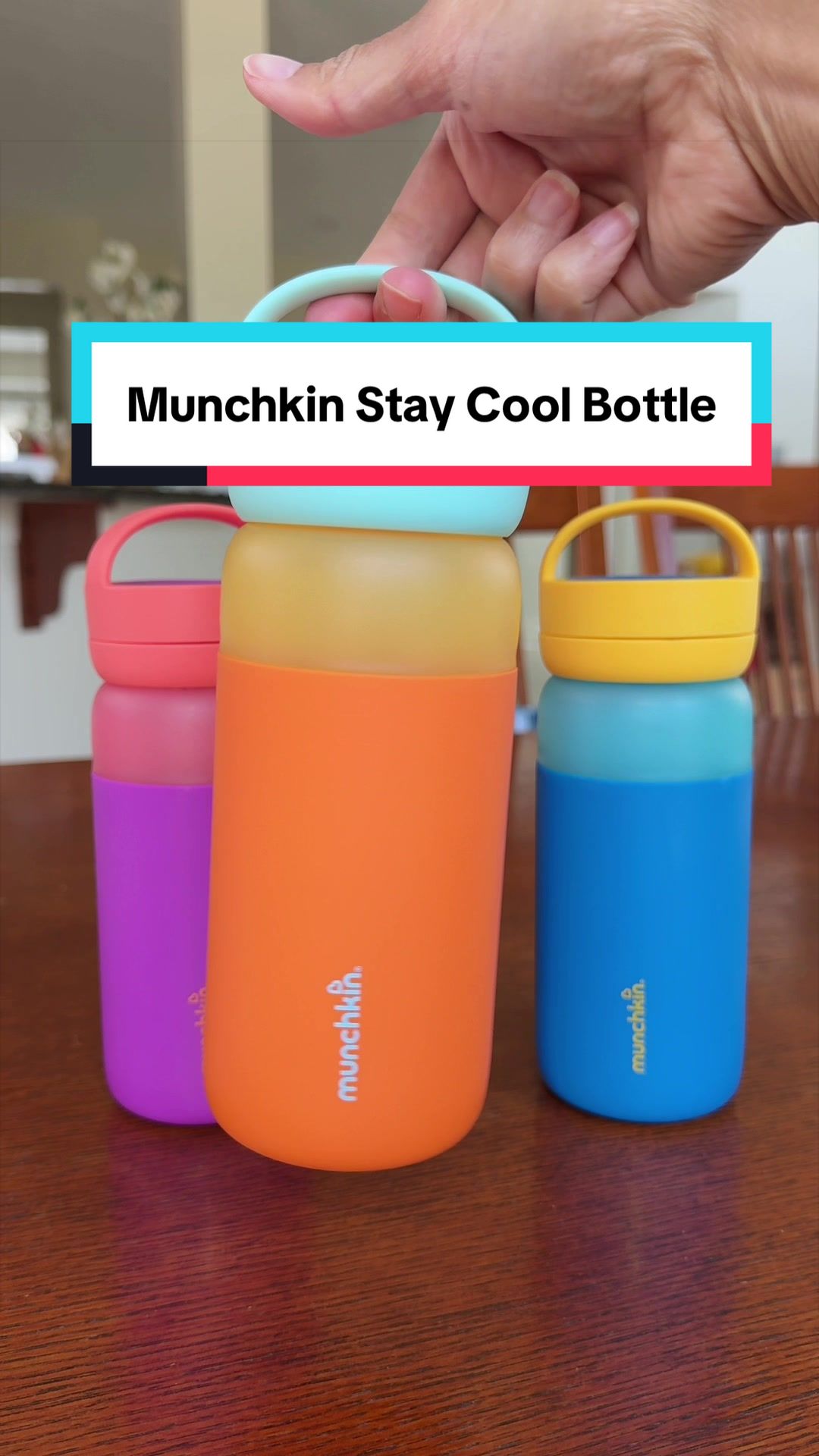 TikTok post by @givethemgrace for Munchkin. Caption reads: These are the stay cool bottles by @Munchkin and....