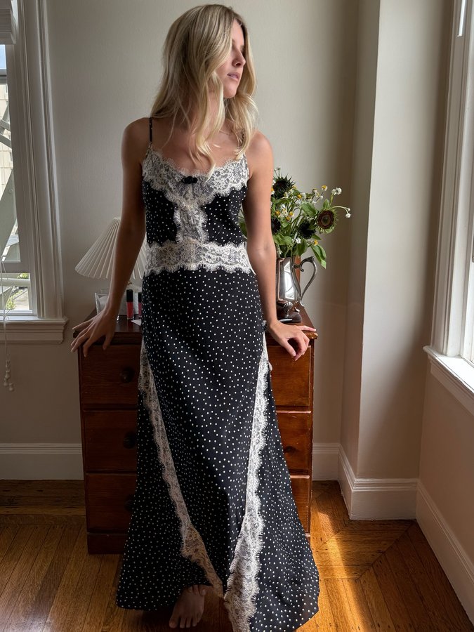 Instagram post by @caitlinburnhamm for Hill House Home. Caption reads: polka dots, lace, and a slow morning at home in....