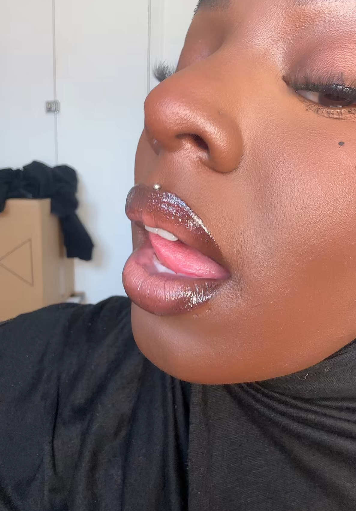 TikTok post by @ameenaroshae for Trigwell Cosmetics. Caption reads: [...] Cosmetics @Too Faced @nyxcosmetics_uk  ....