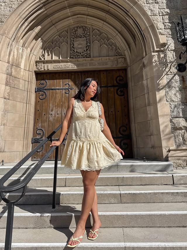 Instagram post by an influencer for Lulus. Caption reads: [...] butter yellow sundress 🌼🍯☀️ @lulus....