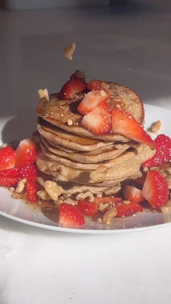 Instagram post by @meganroup for gonnaneedmilk. Caption reads: My go-to Almond Butter Banana Pancakes!! I’m....