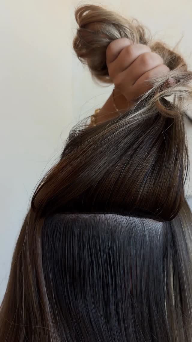 Instagram post by @the.blonde.muse for Donna Bella Hair. Caption reads: 22” Hybrid Weft #DonnaBellaHairExtensions are the....