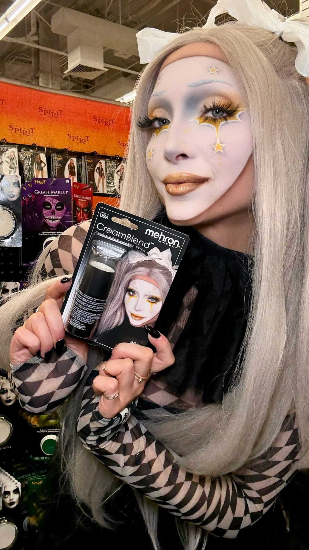 Instagram post by @christina.alexandraa for Mehron Makeup. Caption reads: @mehronmakeup has officially hit *select....