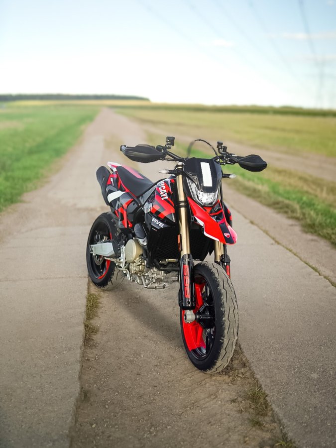 Instagram post by @ducati_leipzig for Ducati. Caption reads: Deine Meinung zur @ducati Hypermotard 698 Mono....