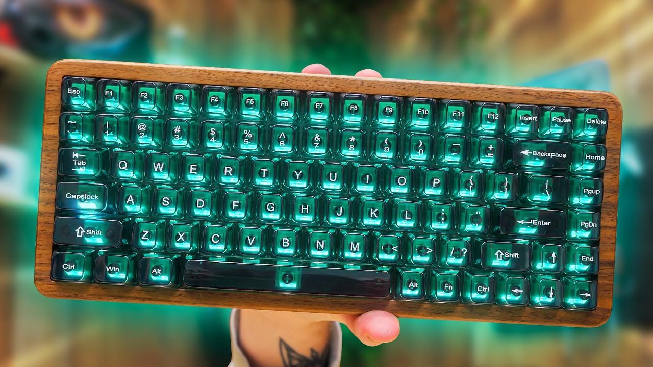 YouTube post by @ToastyBros for Womier Keyboard. Caption reads: The Perfect Budget Aesthetic Gaming Keyboard -....