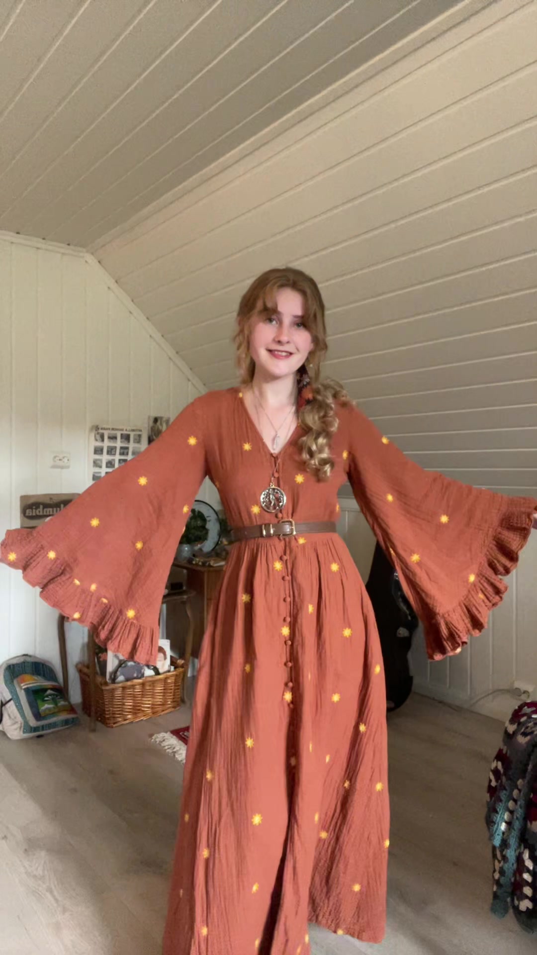 TikTok post by @stinasirena for Ethnasia Jewelry. Caption reads: [...] (sponsored) Earrings: @ethnasia jewelry....