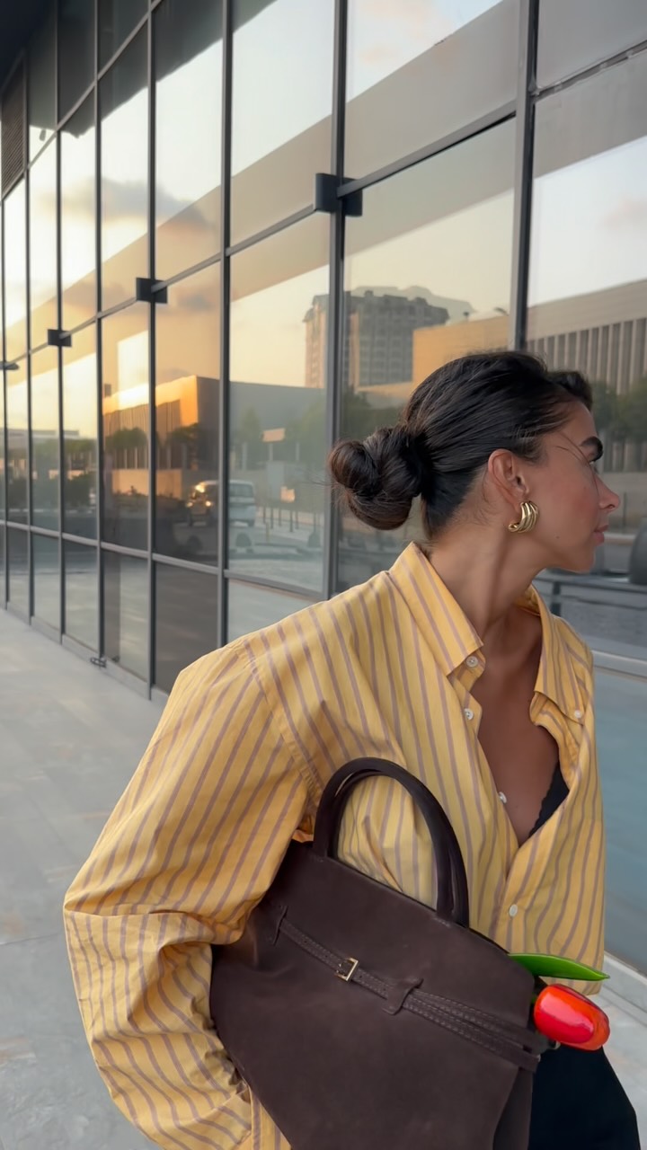 Instagram post by @selennergiz for Manu Atelier. Caption reads: Latest outfit🤎 #fyp #ootd #reklam.