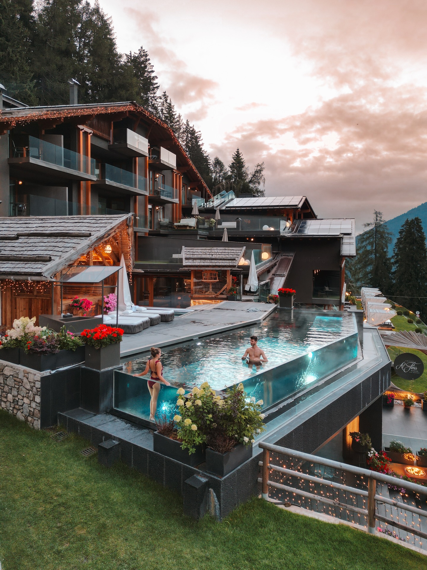 Instagram post by @lisarie__ for Travel + Leisure. Caption reads: When the sun goes down, the magic @chalet_al_foss....