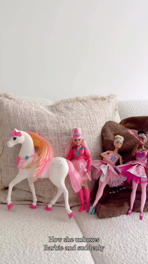Instagram post by @laurajanelambert for Barbie. Caption reads: [...] 🩰✨ Watching Emily unbox the new Barbie in....