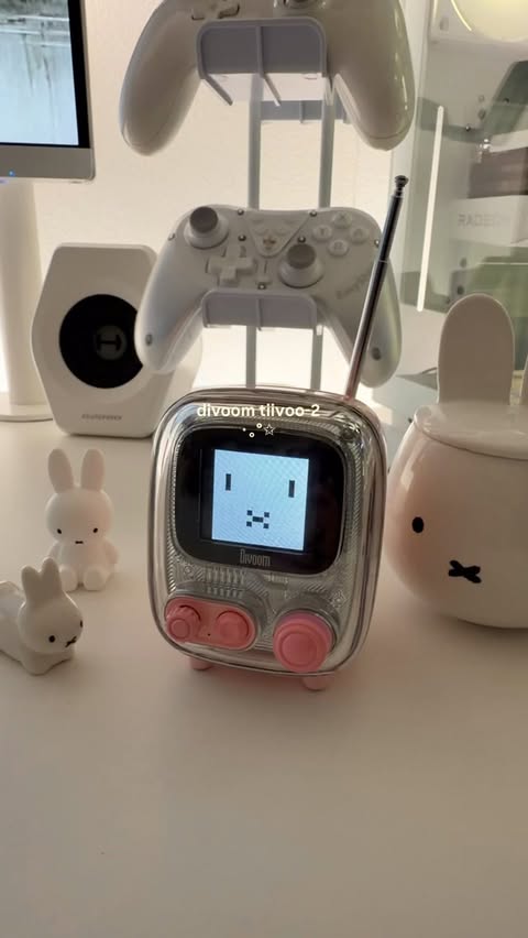 Instagram post by @risascloud for Divoom. Caption reads: a little retro addition to my room 🤍 the divoom....