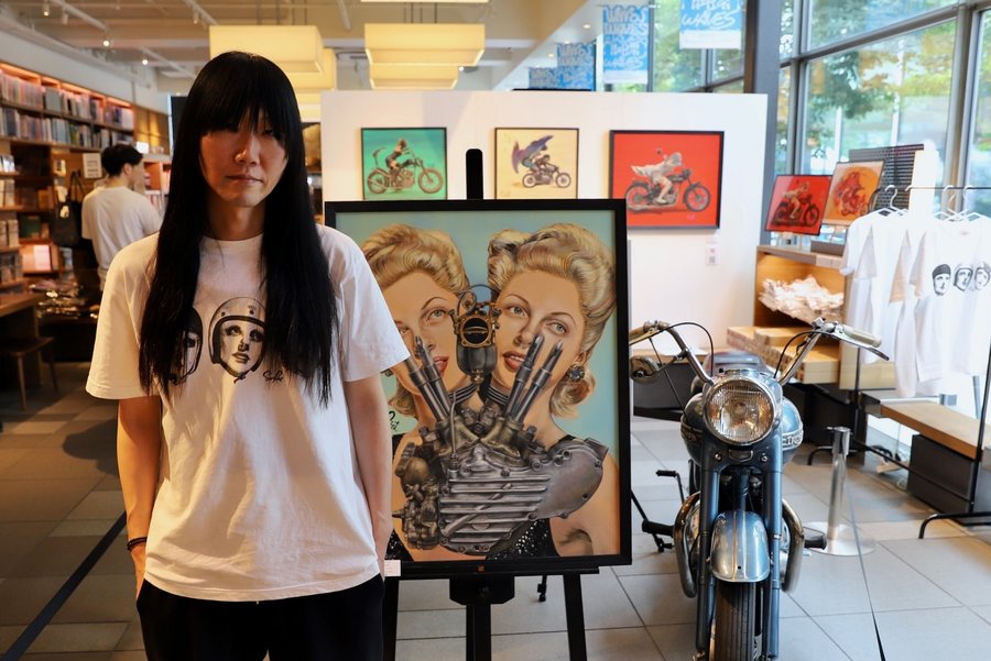 Instagram post by @coolbeans_cb for Triumph Motorcycles. Caption reads: Sanpaint Exhibition 7th 8月9日(土)〜22日(金) @代官山蔦屋書店....