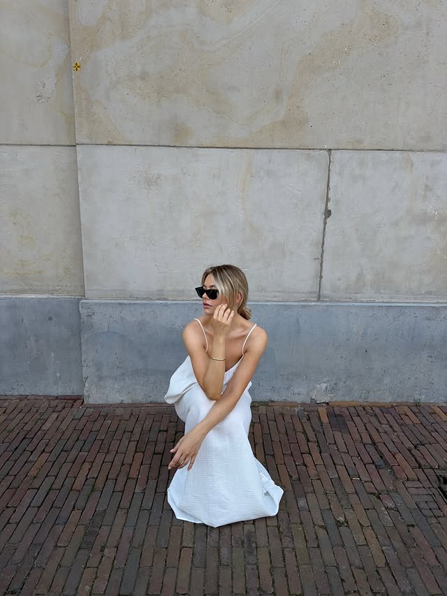 Instagram post by @fleurdijkstra for VILA. Caption reads: [...] for a cute white dress, here it isss 🤍....