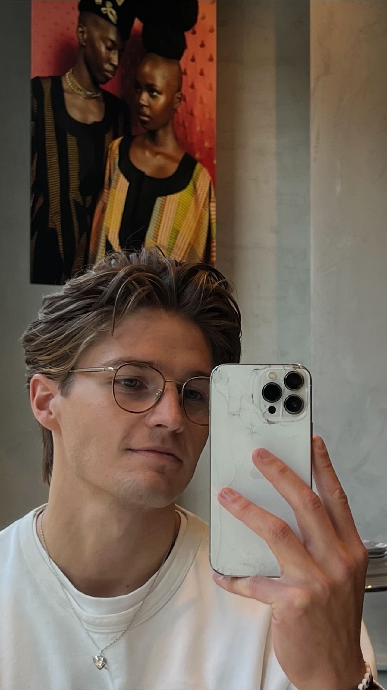 Instagram post by @filiplamprecht for EssilorLuxottica. Caption reads: Paid partnership with @giorgioarmani &....