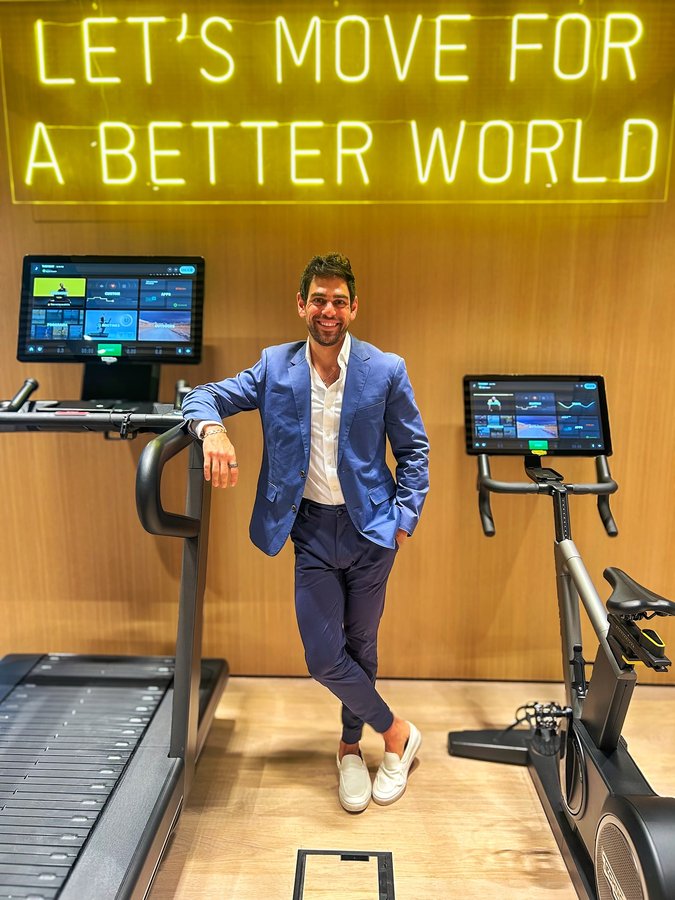 Instagram post by @kaxman for Life Time. Caption reads: ‼️Pumped to share that I’ve started a new role....