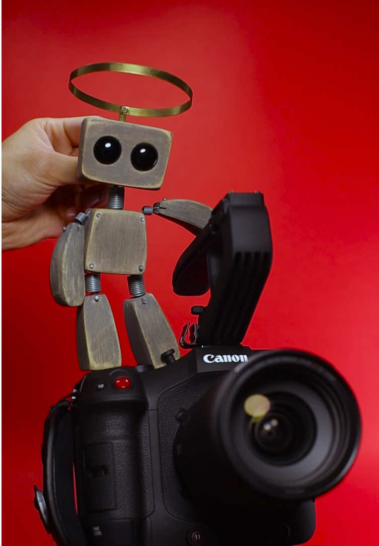 TikTok post by @righteousrobot for Canon USA. Caption reads: A day on the set of a paper movie 💪 with the....