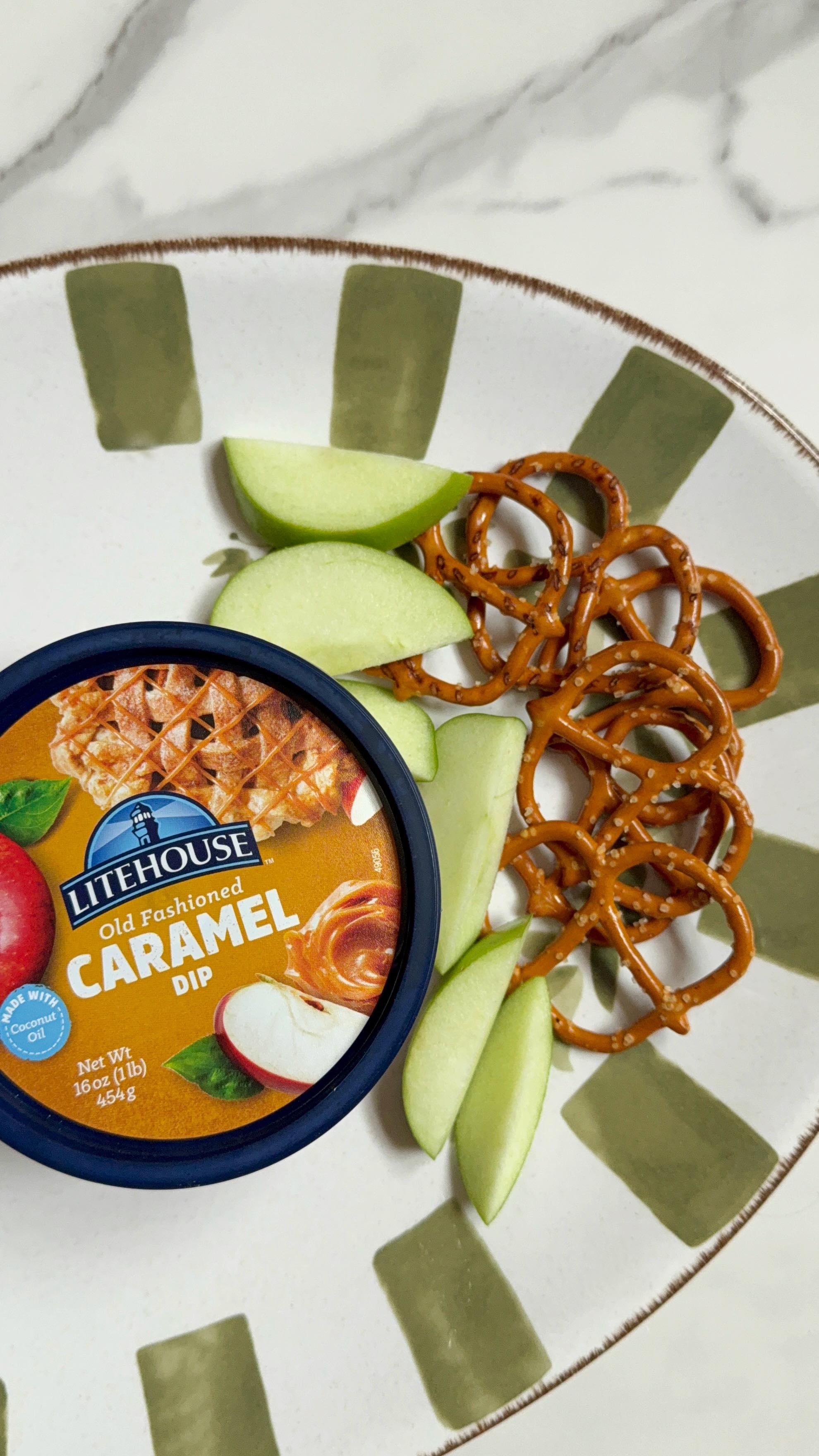 Instagram post by @lovetoreviewbykristen for Litehouse Foods. Caption reads: Apples + pretzels + caramel = the fall trifecta....
