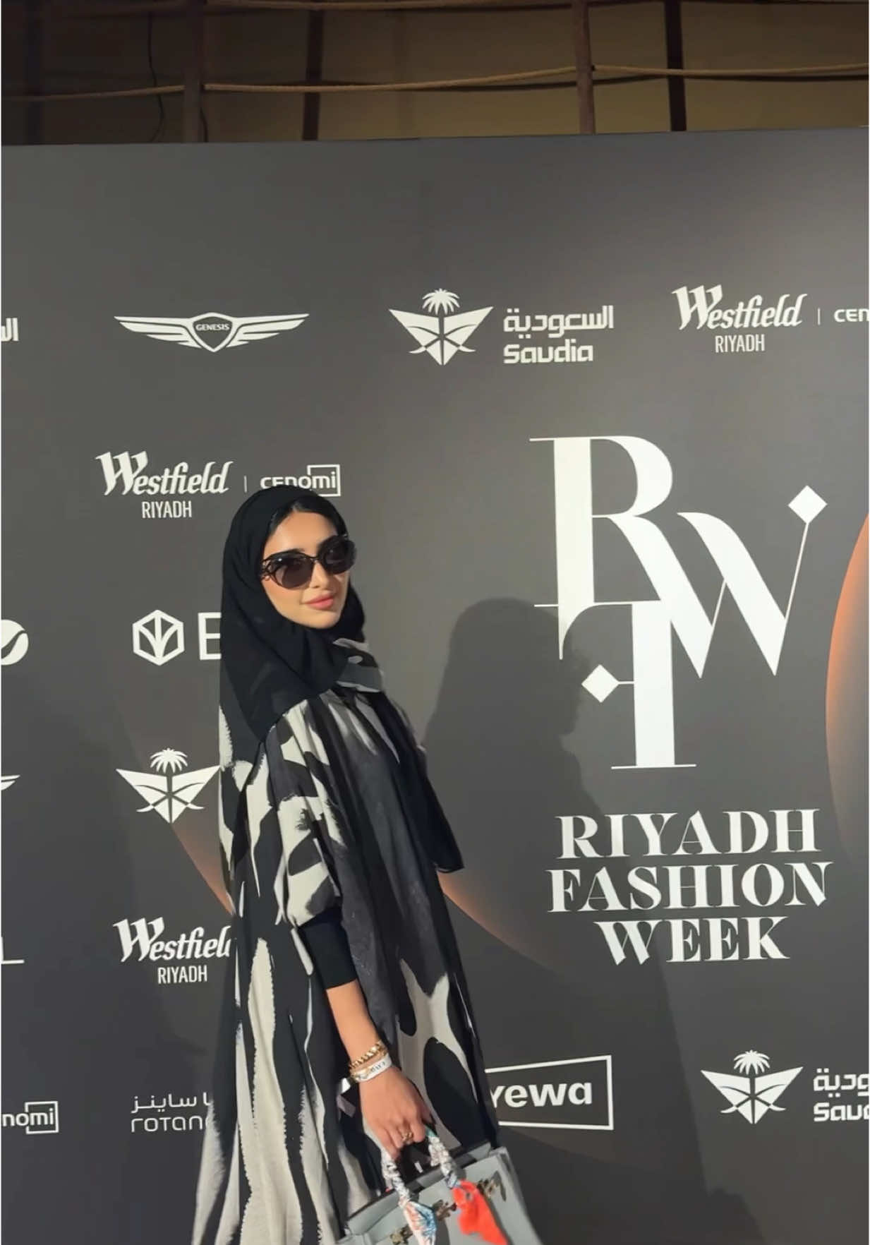 TikTok post by @_sios for eyewa. Caption reads: @eyewa @eLSeed  #riyadhfasionweek #eyewaxelseed ....