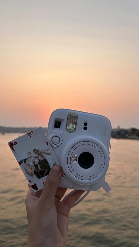 Instagram post by @triyata_ch for Instax. Caption reads: [...] pause and keep 📸🤍 #DontJustTakeGive....