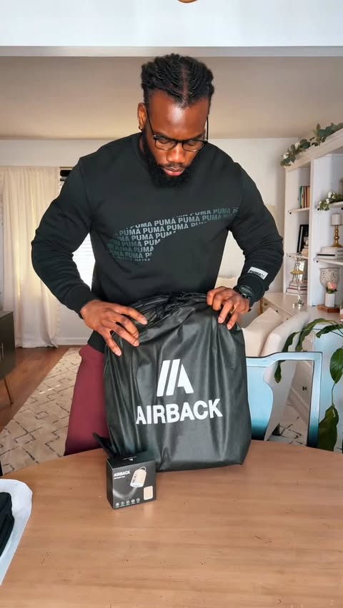 Instagram post by @official_dj_ogwo for Airback. Caption reads: [...] the grind. Protected for the journey.....