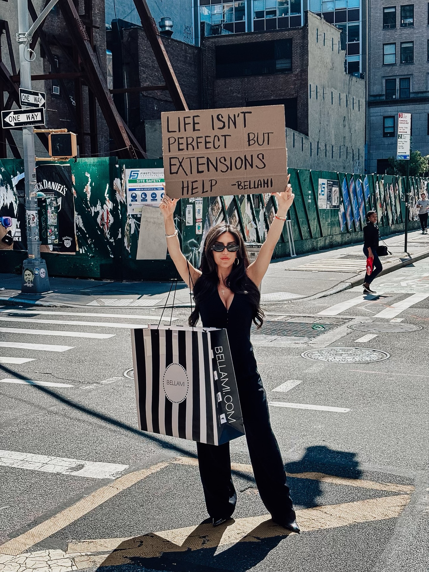 Instagram post by @manegirl_ for Bellami Hair. Caption reads: Keeping up with #NYFW, one extension install at a....