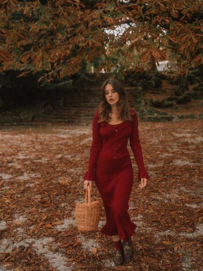 Instagram post by @zhukova_dasha_ for Rihoas. Caption reads: Vibes: “Morticia in red” ♥️ Wearing....