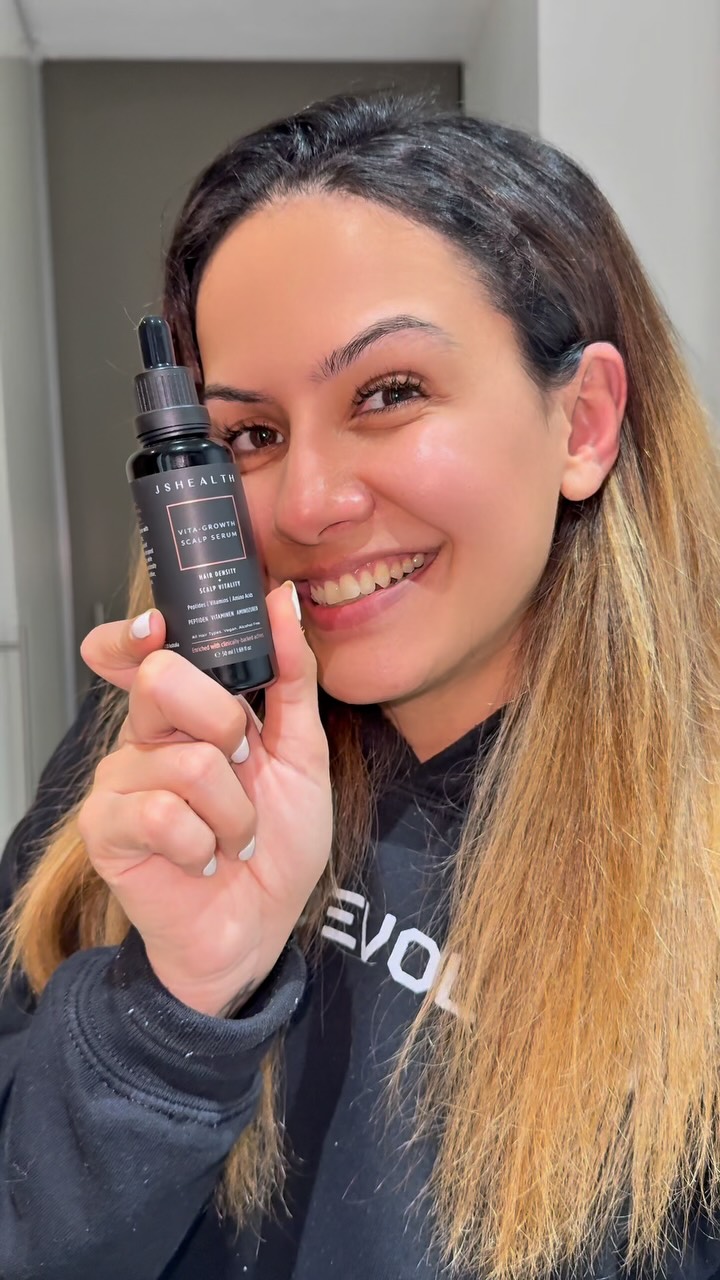 Instagram post by @seemafvlkrum for JSHealth Vitamins. Caption reads: Consistency over perfection. Giving my strands the....