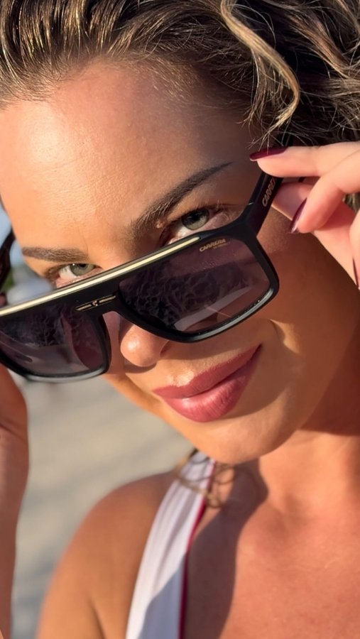 Instagram post by @jovana_montenegro for Carrera Eyewear. Caption reads: Serving looks with @carrera #ad
.
.
.
.#Carrera....