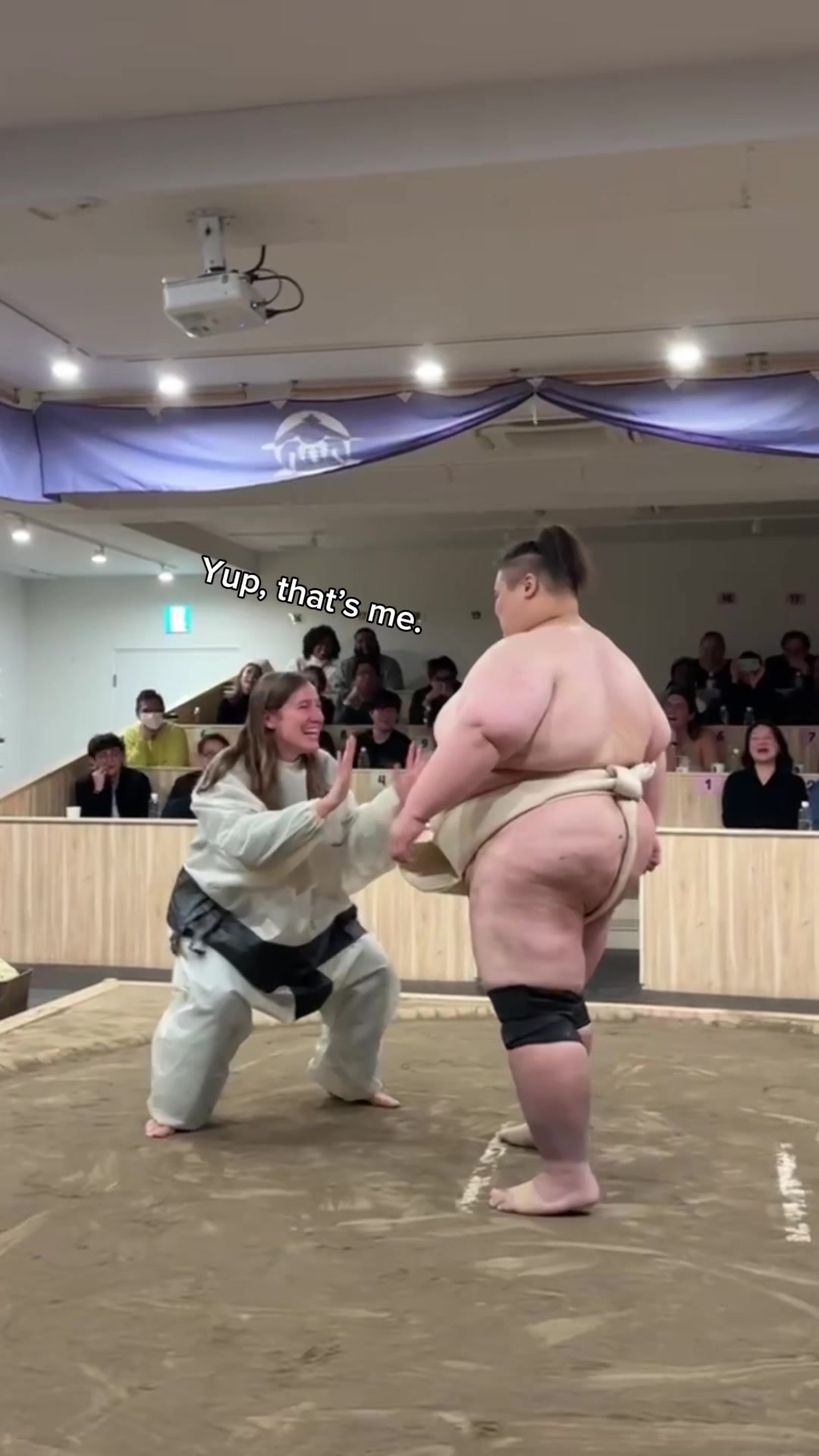 TikTok post by @wolvesandwaterfalls for Viator. Caption reads: Antagonize a sumo wrestler in Japan and see what....