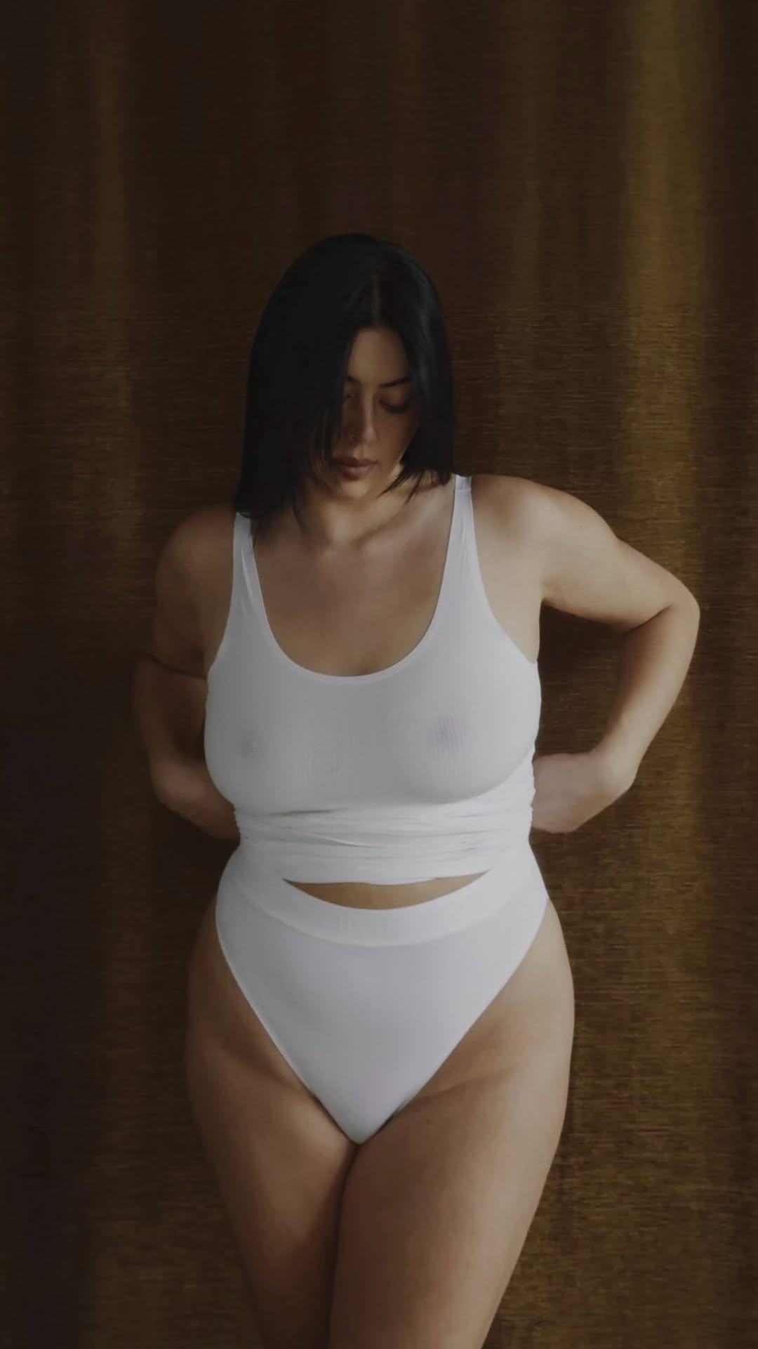 Instagram post by @lcchan for Wolford. Caption reads: feeling like myself—shot by @hayleykosan—in....