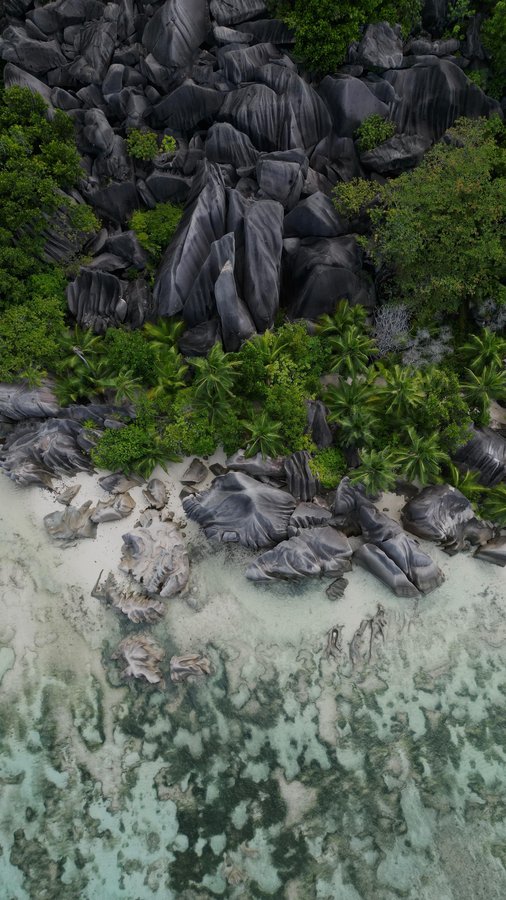 Instagram post by @benoitdouady for Tourlane. Caption reads: [...] Anse Source d’Argent, Seychelles 🇸🇨

With....