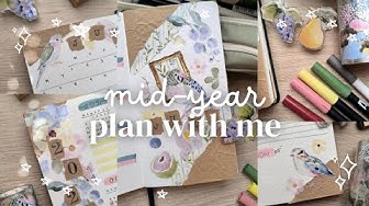YouTube post by @bujobyfilo for – Stationery Pal. Caption reads: mid-year reset 🦜 july 2026 bullet journal setup.