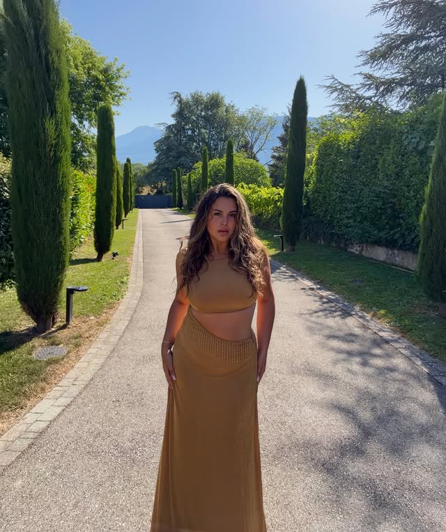 Instagram post by @iammarinely for Runaway The Label. Caption reads: [...] hair and gold dress @runawaythelabel....