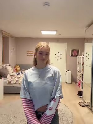 TikTok post by @evia.krm for SCUFFERS. Caption reads: ad Outfit inspo🤍🎀 Longsleeve from @SCUFFERS ✨....