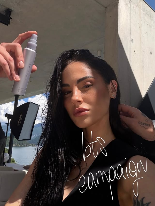 Instagram post by @giuliadelellis103 for FENTY SKIN. Caption reads: [...] On set with Dew N Plump @fentyskin available....