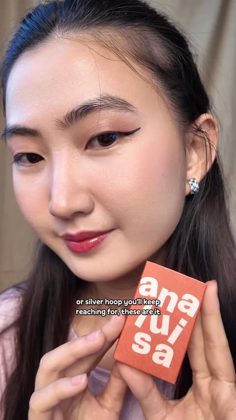 Instagram post by @_singyou_ for ana luisa. Caption reads: minimal. timeless. obsessed.
 @analuisany....