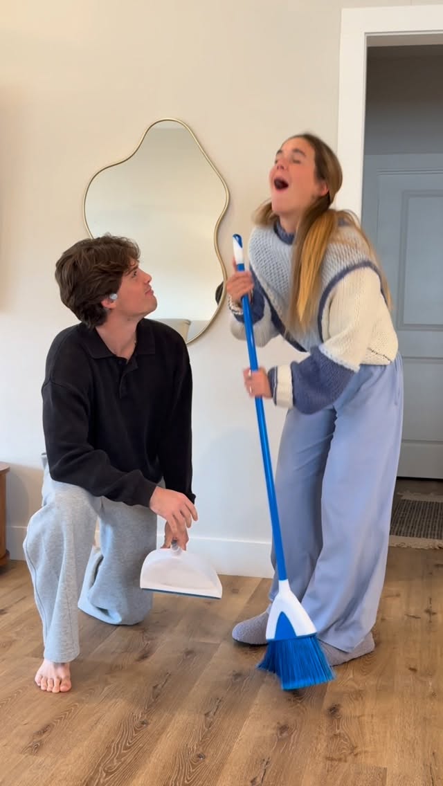 Instagram post by @abbyndryan for Shokz. Caption reads: Chore day made it easy with @shokzusa!🧹🧽

#ad....