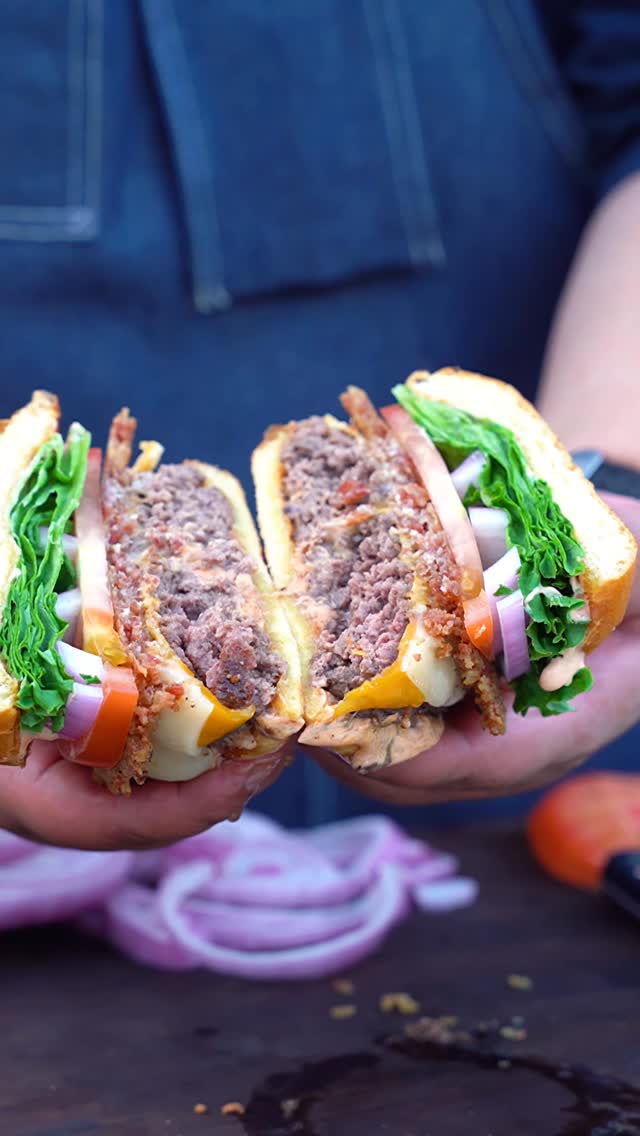 Instagram post by @adventuresofafatguy for Lodge Cast Iron. Caption reads: Why add tiny strips of bacon to your burger, when....