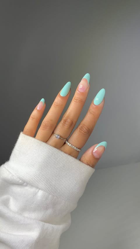 Instagram post by @glossytipped for essie. Caption reads: [...] on rotation this summer :’) 🦋🍬👙ft. @essie....