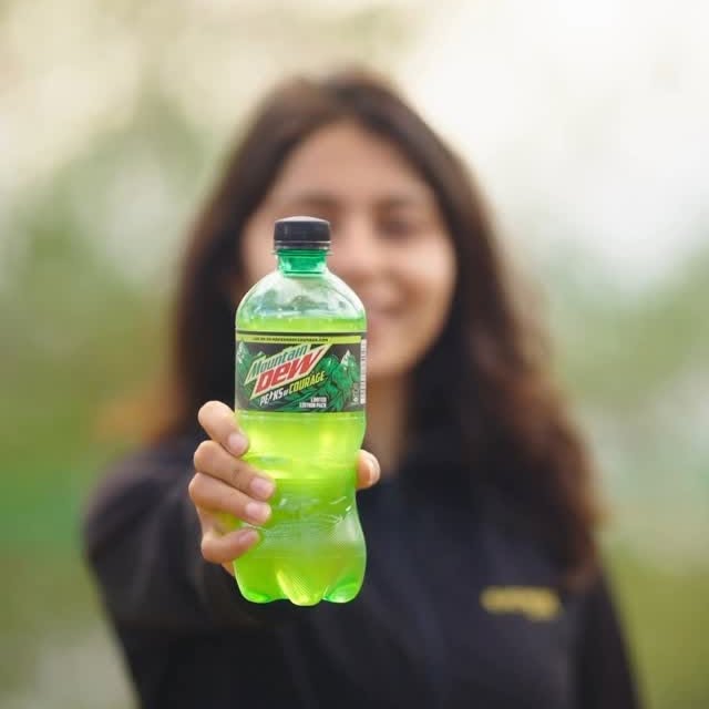 Instagram post by @divyadhakal_ for Mountain Dew. Caption reads: Everyone knows Everest. But Nepal is home to....