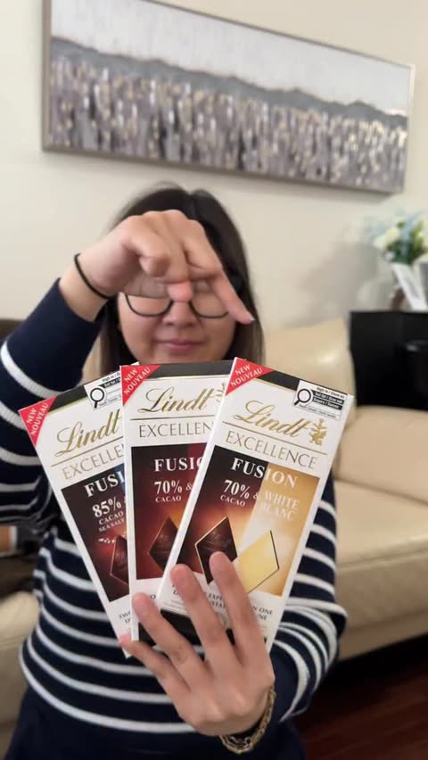 Instagram post by @bwit.bunz for Lindt. Caption reads: @lindtcanada EXCELLENCE Fusion chocolate bars....
