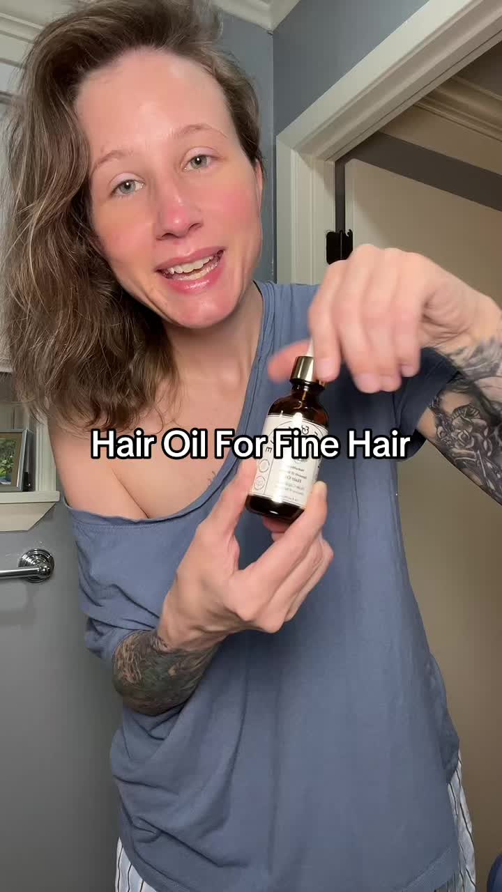 TikTok post by @the_mrsstroud for Fable and Mane. Caption reads: Finding a light weight oil that nourishes my hair....