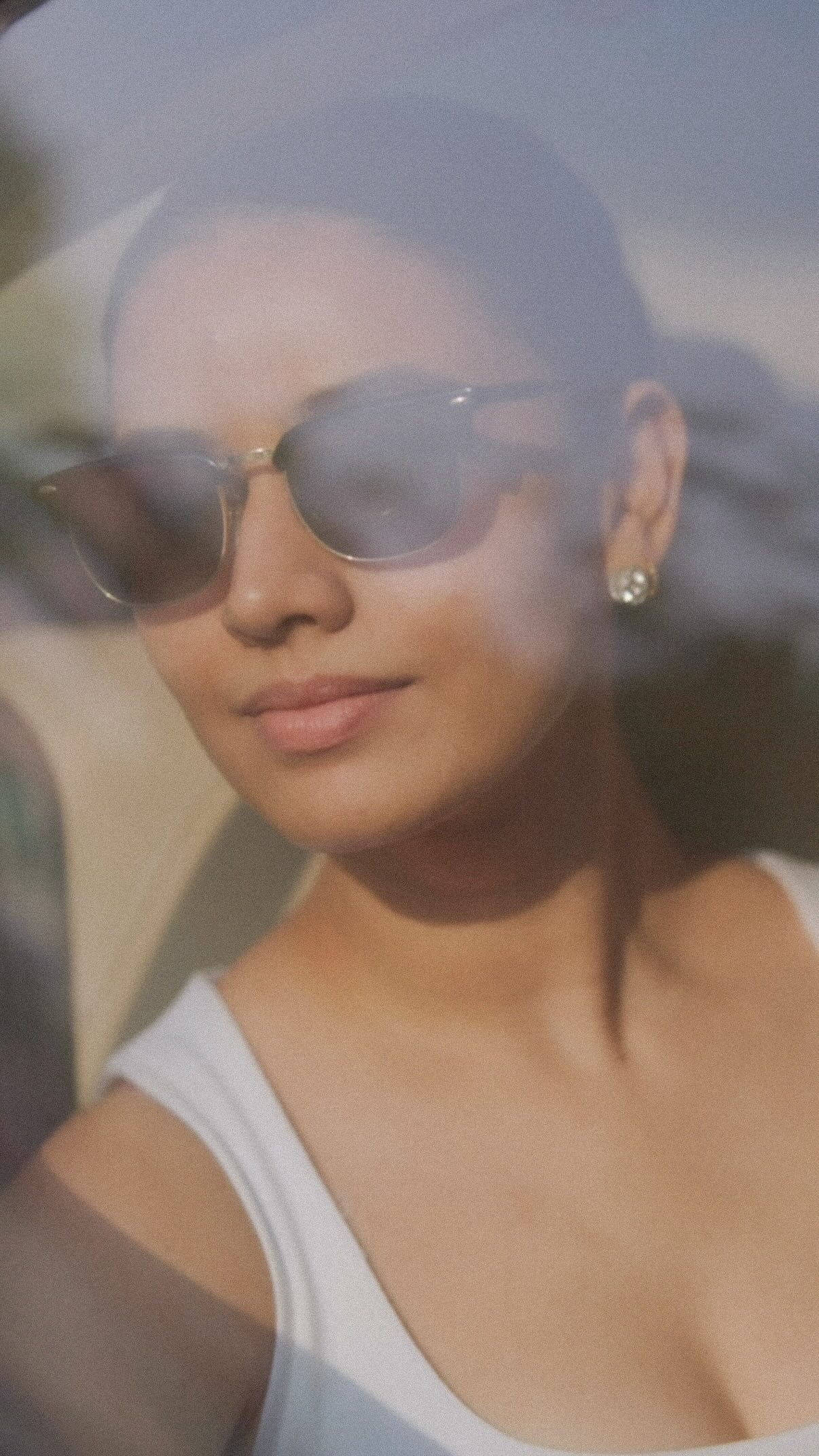 Instagram post by @mansha.karhana for Simple Skincare. Caption reads: the sun tried peekaboo.
my UV fluid said “aw,....