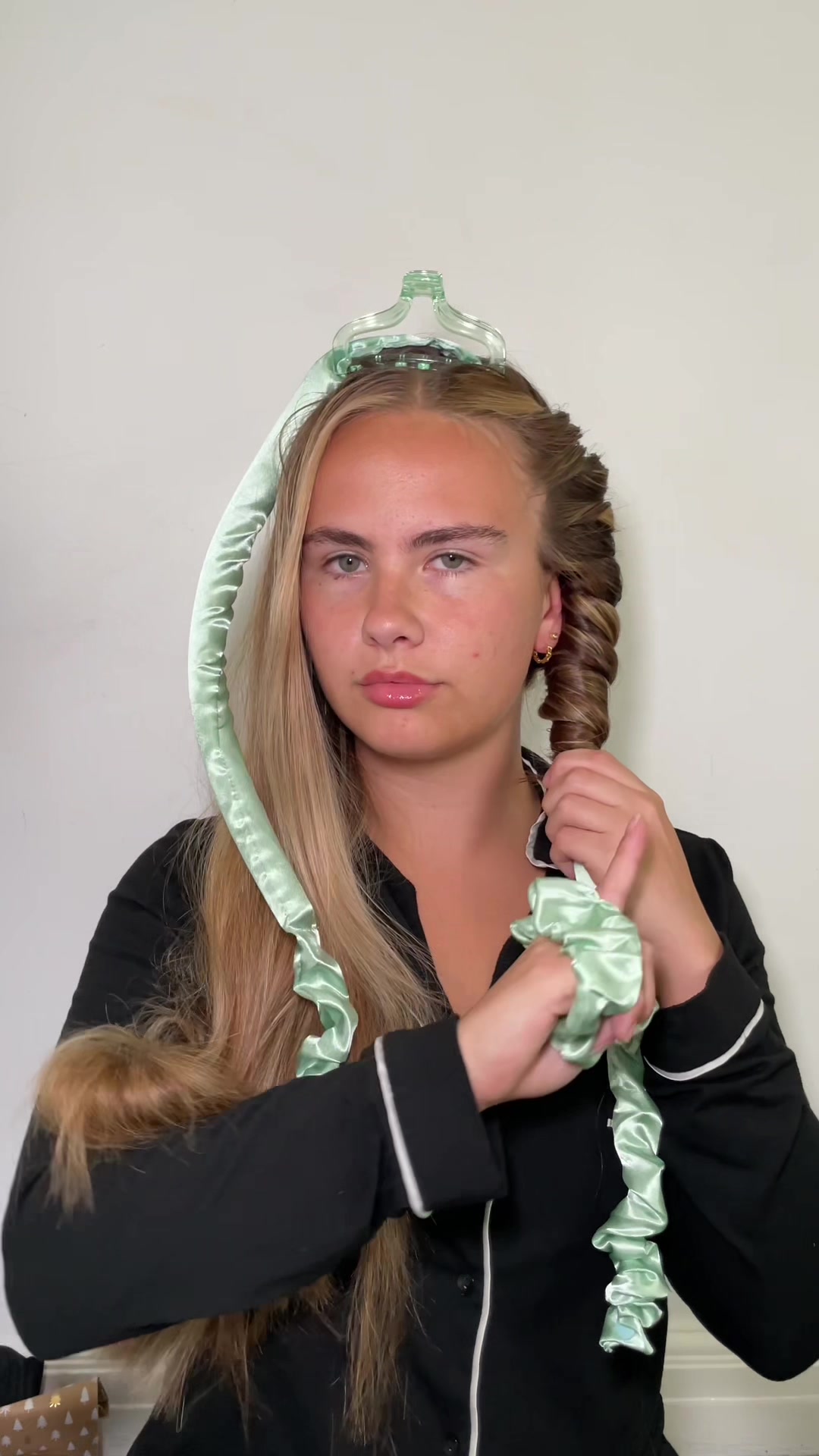 TikTok post by @elliepritchardd for Give Me Cosmetics. Caption reads: [...] Heatless Curls with me 🤍💁🏽‍♀️ @Give Me....