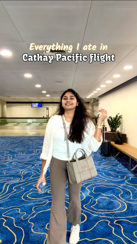 Instagram post by @tejaswini.vodhya for Cathay Pacific. Caption reads: Had the best time flying with Cathay Pacific....
