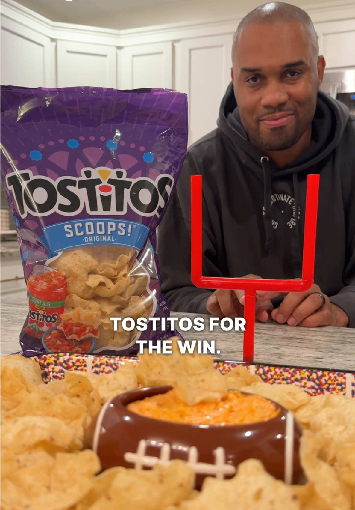TikTok post by @motivatedbymylan for Tostitos. Caption reads: #ad Tostitos for the win! 👌🏽 My Gameday Ritual:....