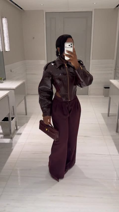 Instagram post by @iamemmanuela_ for Elisabetta Franchi. Caption reads: Outfit of the day 🤍 

Comment BURGUNDY below to....