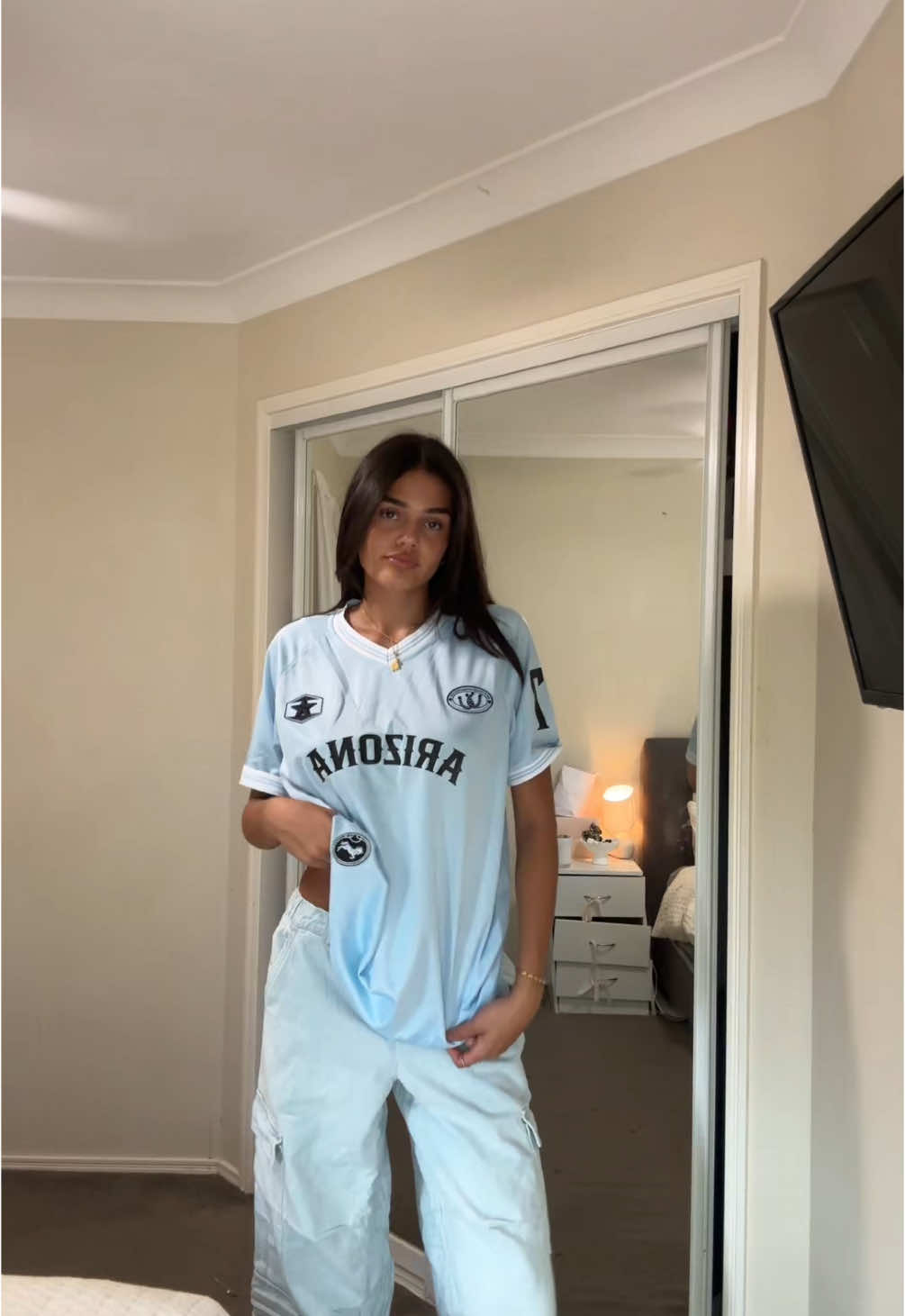 TikTok post by @bellaodow for Factorie. Caption reads: Factorie try on obsessed!! @Factorie #collab #fyp....