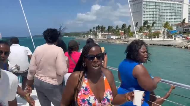 Instagram post by @21kryme for Sandals Resorts. Caption reads: [...] catamaran trip on Teachers Day by....