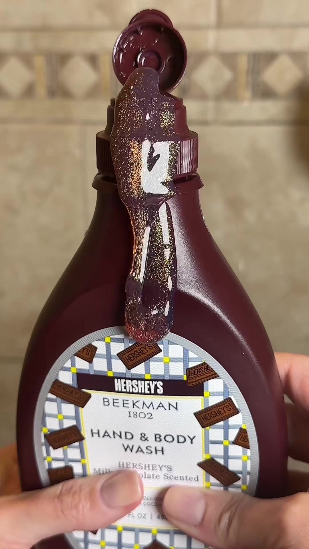 TikTok post by @ambrosial_jax for Beekman 1802. Caption reads: [...] in my shower 🍫🚿 The @Beekman 1802 x....