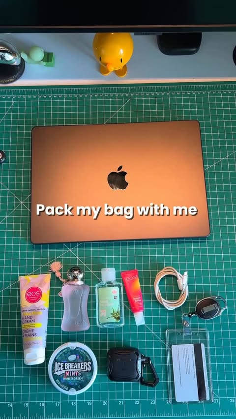 Instagram post by @bintaines for Tomtoc. Caption reads: [...] safe and my bag clutter free, 1 use the....